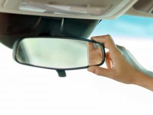 Custom manufacturing of interior rear view mirrors for police vehicles